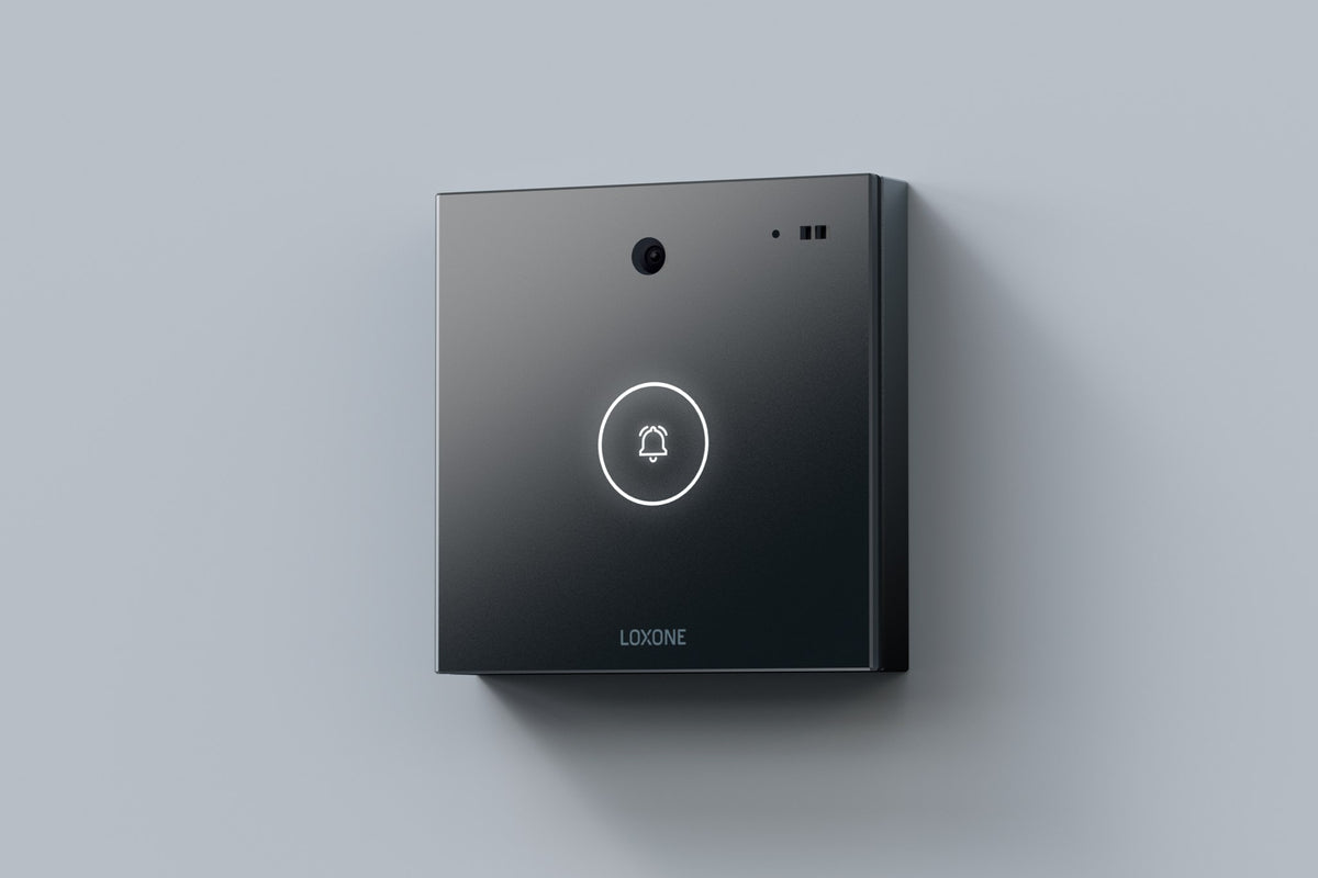 Loxone Intercom in anthracite mounted on a light grey wall