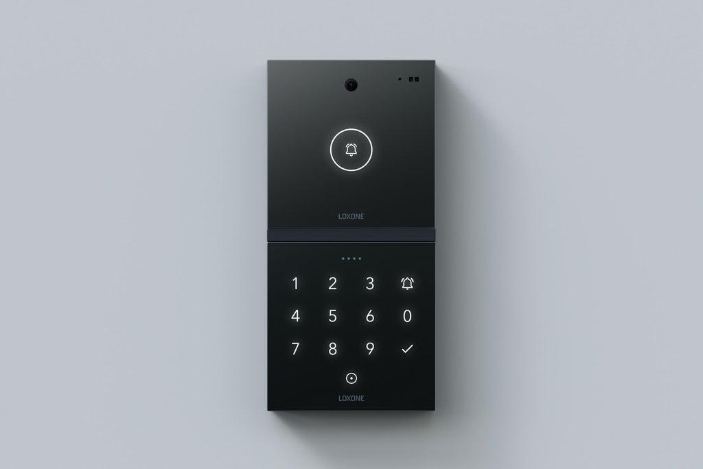Loxone Intercom in anthracite on a grey wall, shown with NFC Code Touch, sold separately