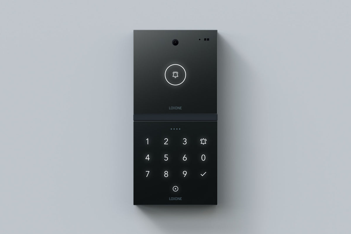 Loxone Intercom in anthracite on a grey wall, shown with NFC Code Touch, sold separately