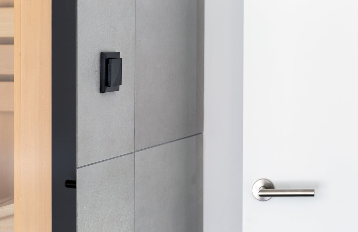 Loxone Room Comfort Sensor Tree in anthracite on a grey wall