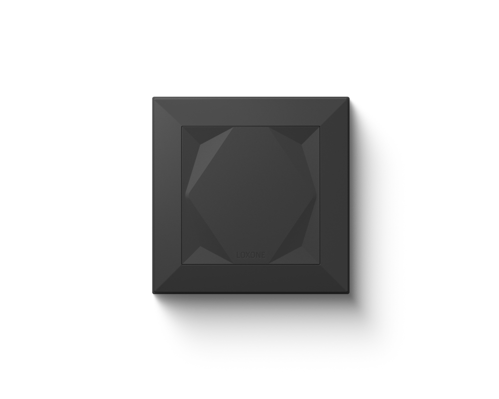 Loxone Touch wall switch in anthracite with its faceted touch surface