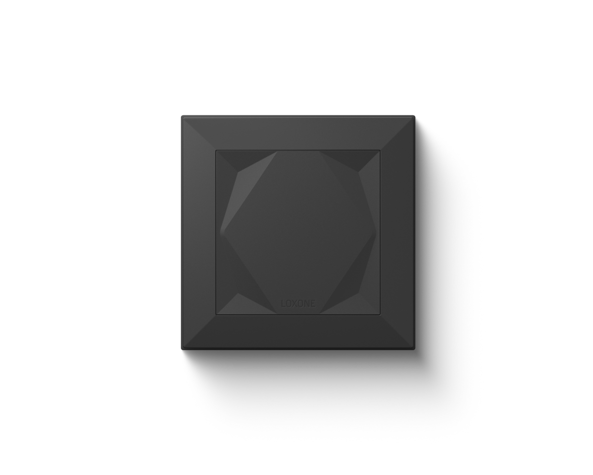 Loxone Touch wall switch in anthracite with its faceted touch surface