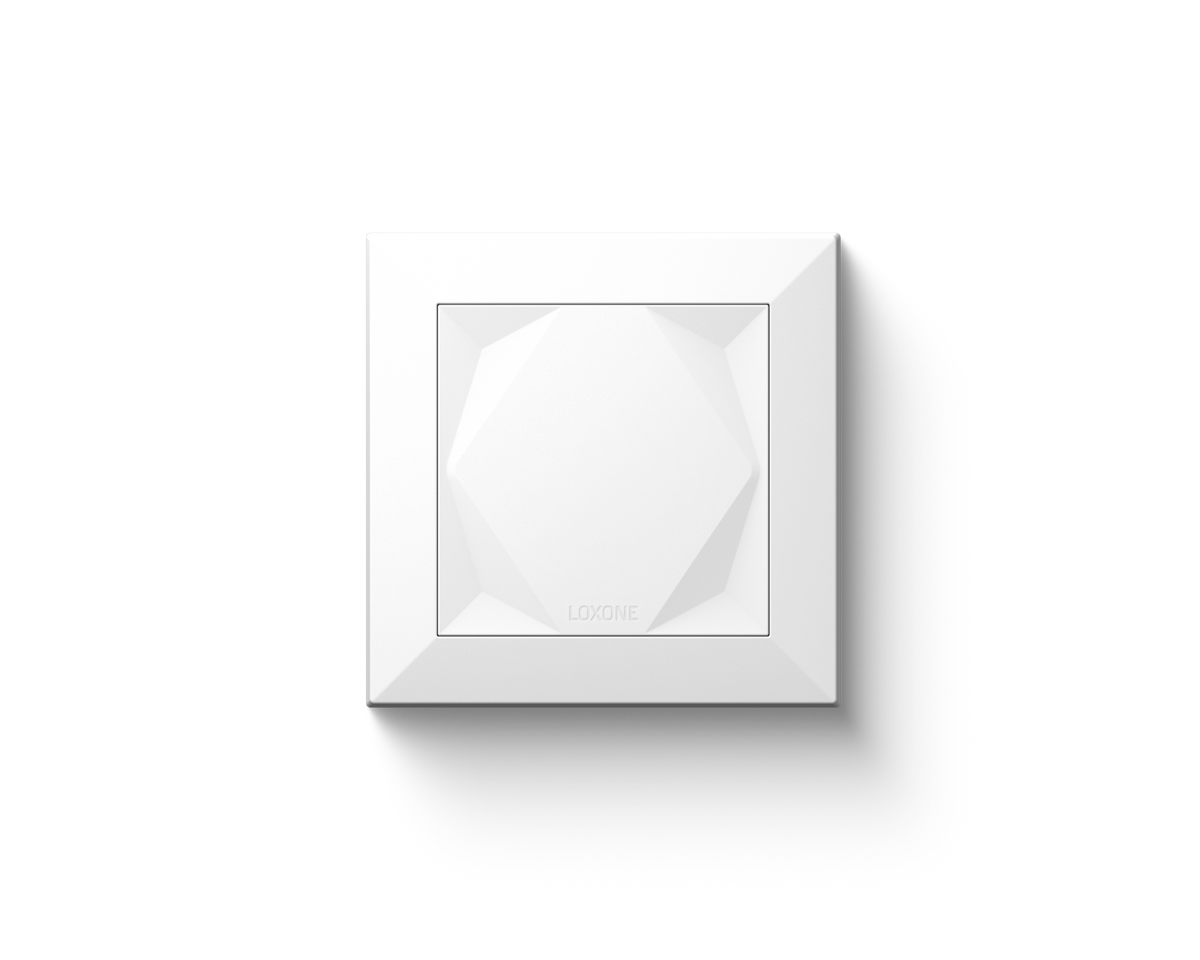Loxone Touch wall switch in white with its faceted touch surface